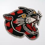 Wild Ember Rug – Black Panther with Red & Gold Accents Rugs